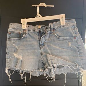 Ripped blue Jean shorts